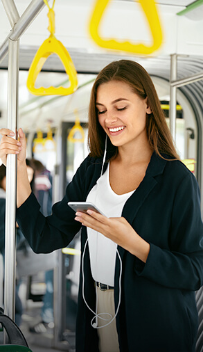 Girl looking at phone and smiling